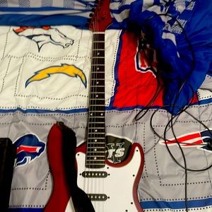 Marroon BCP guitar NOT INCLUDING TUNER, CASE OR PICKS. AMP INCLUDED.